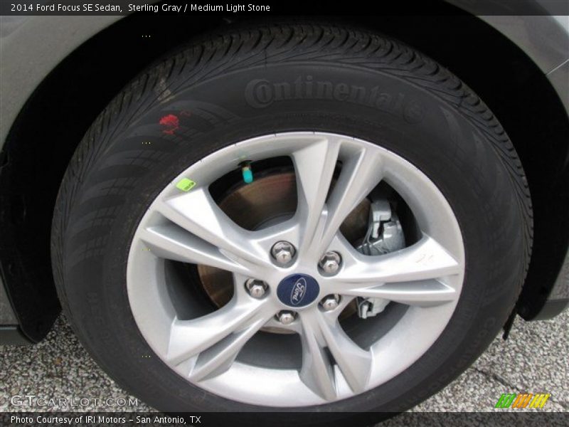 Sterling Gray / Medium Light Stone 2014 Ford Focus SE Sedan