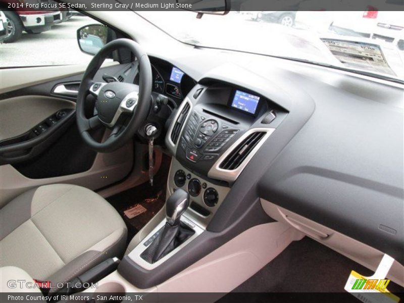 Sterling Gray / Medium Light Stone 2014 Ford Focus SE Sedan