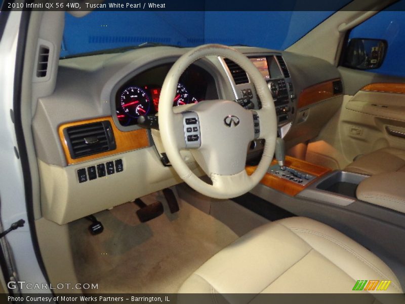 Tuscan White Pearl / Wheat 2010 Infiniti QX 56 4WD