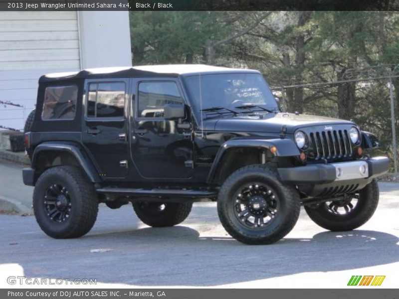 Black / Black 2013 Jeep Wrangler Unlimited Sahara 4x4