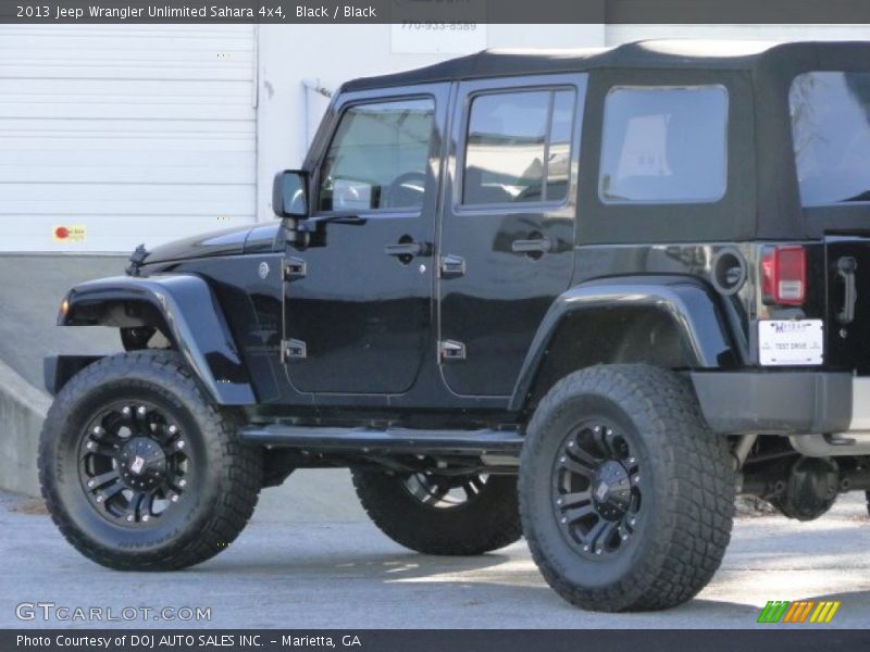 Black / Black 2013 Jeep Wrangler Unlimited Sahara 4x4