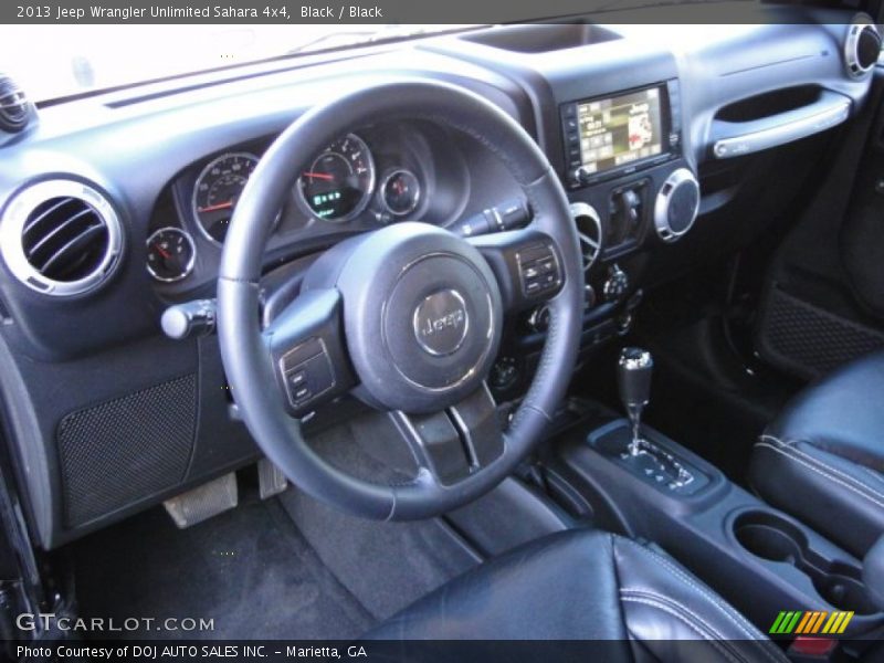 Black / Black 2013 Jeep Wrangler Unlimited Sahara 4x4