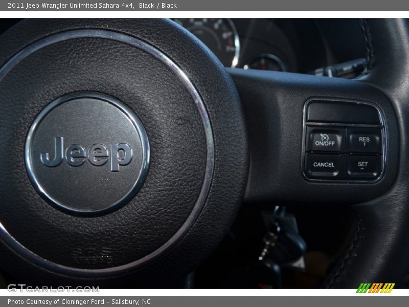 Black / Black 2011 Jeep Wrangler Unlimited Sahara 4x4