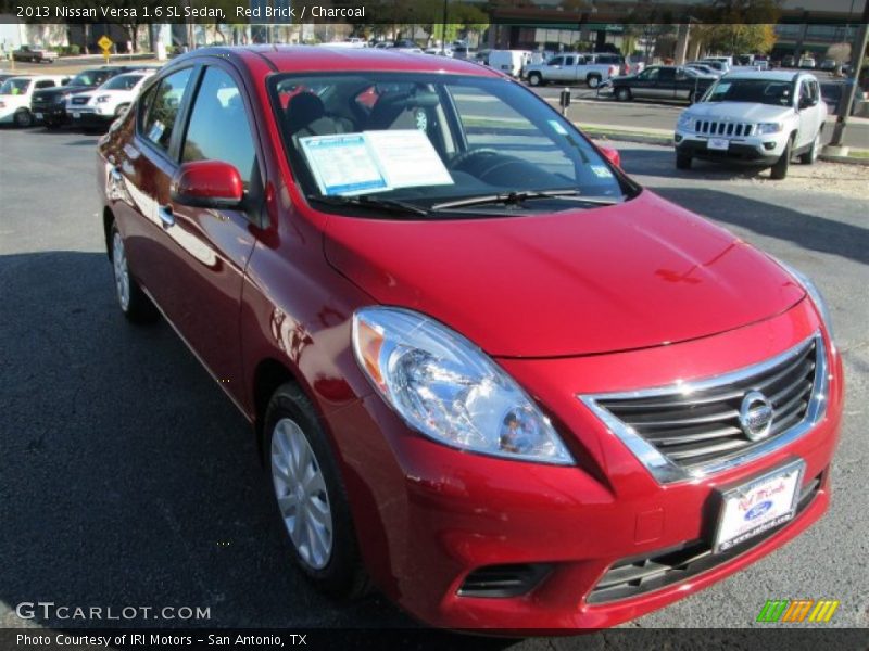 Red Brick / Charcoal 2013 Nissan Versa 1.6 SL Sedan