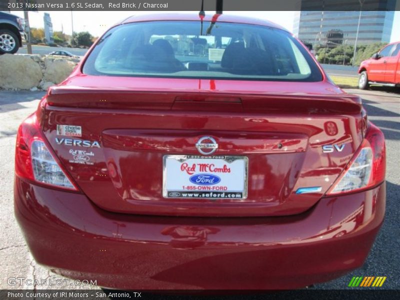 Red Brick / Charcoal 2013 Nissan Versa 1.6 SL Sedan