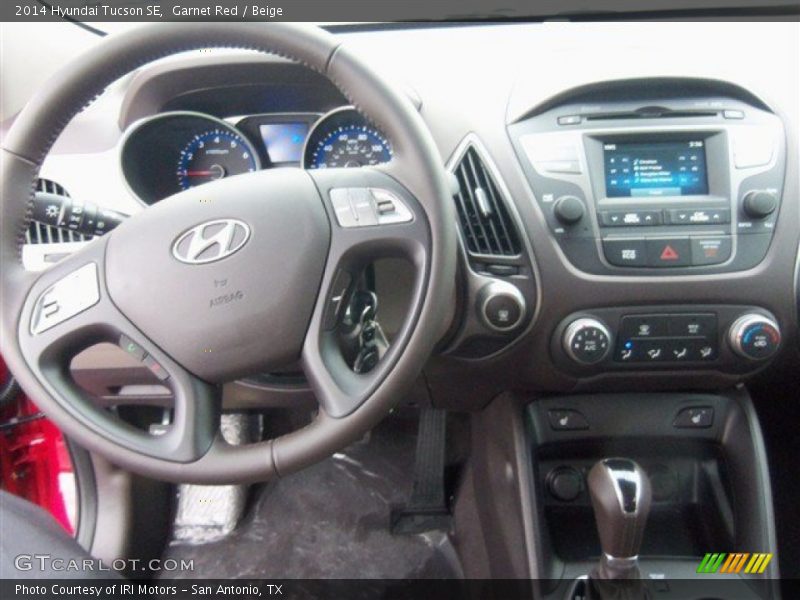 Garnet Red / Beige 2014 Hyundai Tucson SE