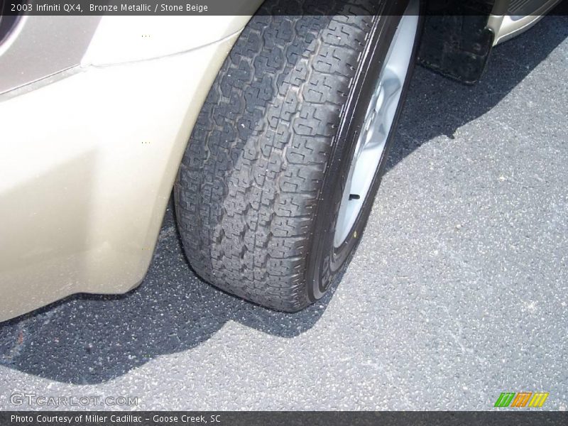 Bronze Metallic / Stone Beige 2003 Infiniti QX4
