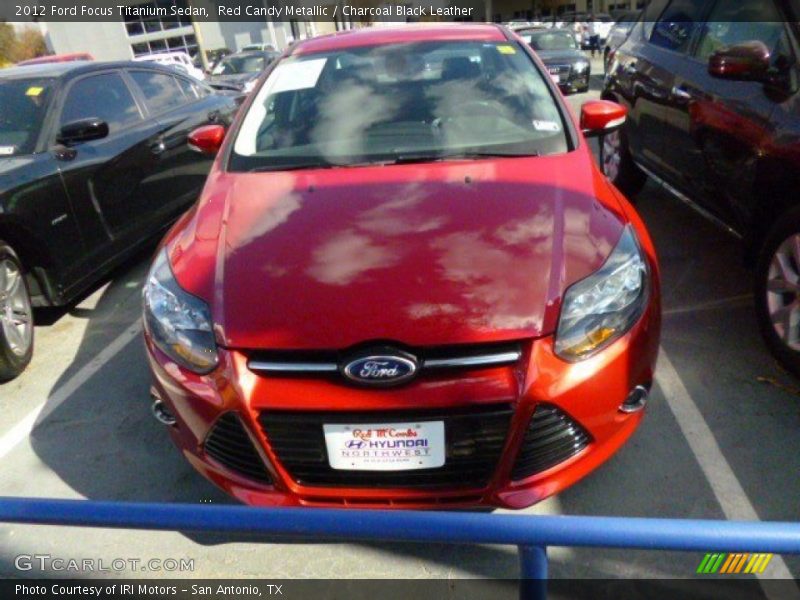 Red Candy Metallic / Charcoal Black Leather 2012 Ford Focus Titanium Sedan