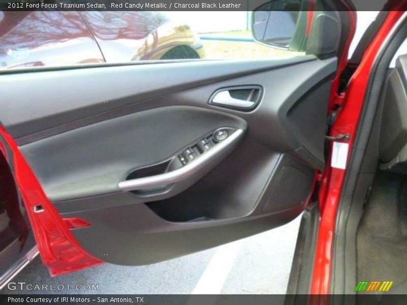 Red Candy Metallic / Charcoal Black Leather 2012 Ford Focus Titanium Sedan