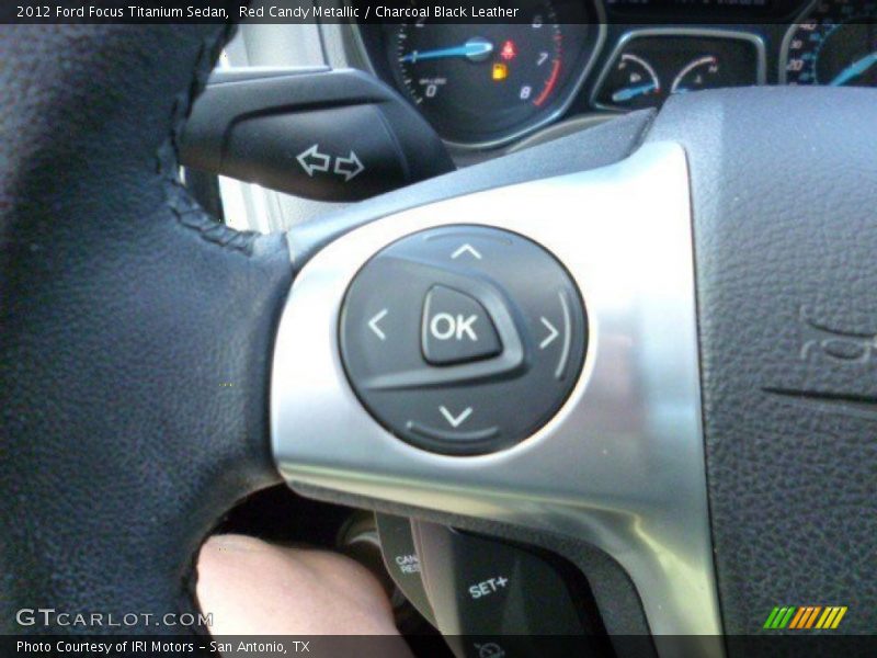 Red Candy Metallic / Charcoal Black Leather 2012 Ford Focus Titanium Sedan
