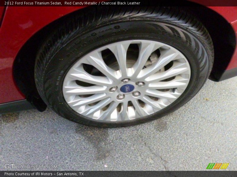 Red Candy Metallic / Charcoal Black Leather 2012 Ford Focus Titanium Sedan