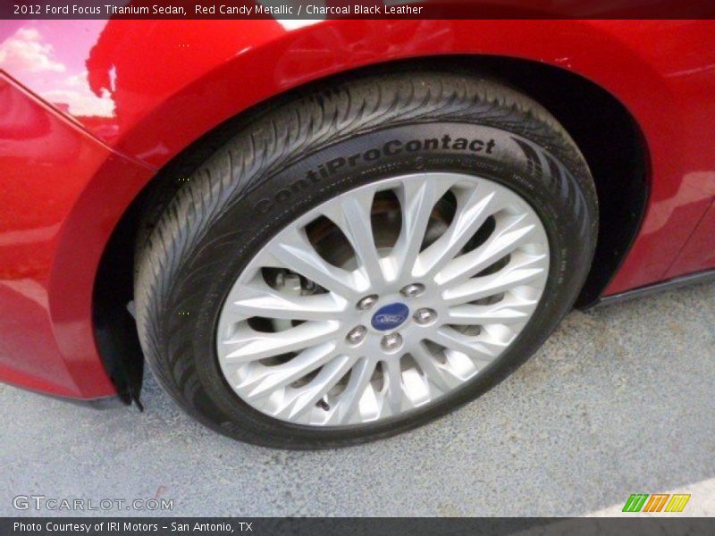 Red Candy Metallic / Charcoal Black Leather 2012 Ford Focus Titanium Sedan
