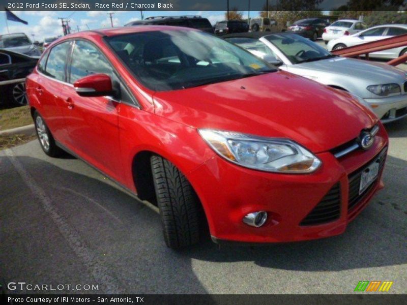 Race Red / Charcoal Black 2012 Ford Focus SEL Sedan