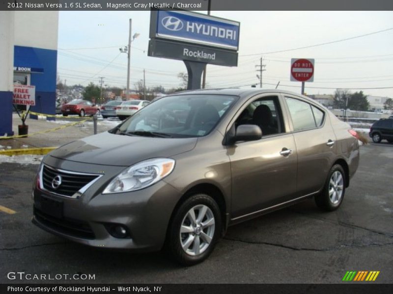 Magnetic Gray Metallic / Charcoal 2012 Nissan Versa 1.6 SL Sedan