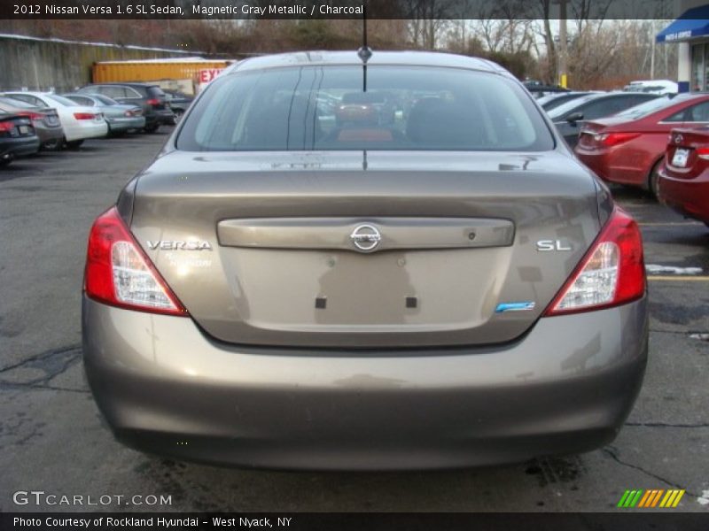 Magnetic Gray Metallic / Charcoal 2012 Nissan Versa 1.6 SL Sedan