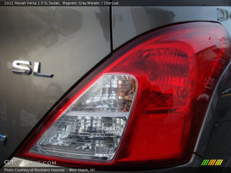 Magnetic Gray Metallic / Charcoal 2012 Nissan Versa 1.6 SL Sedan
