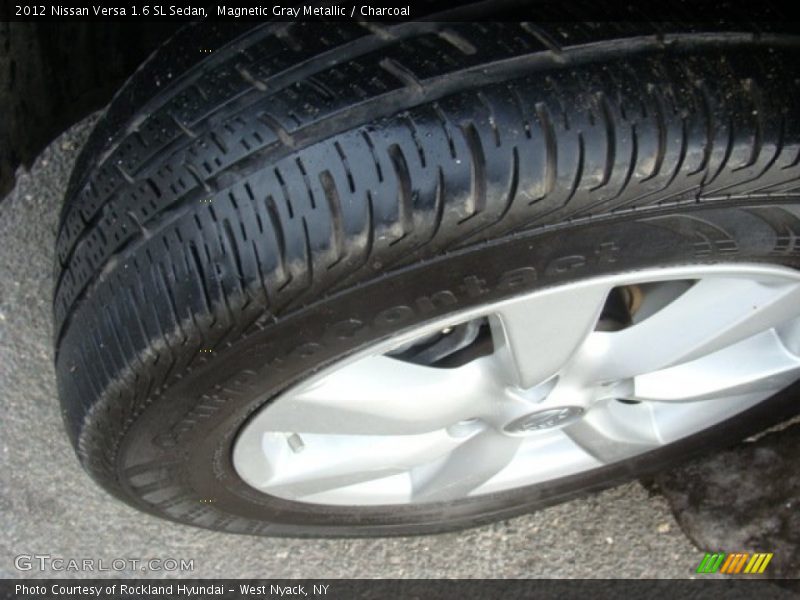 Magnetic Gray Metallic / Charcoal 2012 Nissan Versa 1.6 SL Sedan
