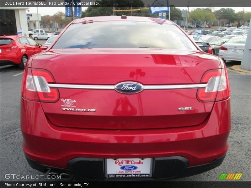 Red Candy / Charcoal Black 2011 Ford Taurus SEL