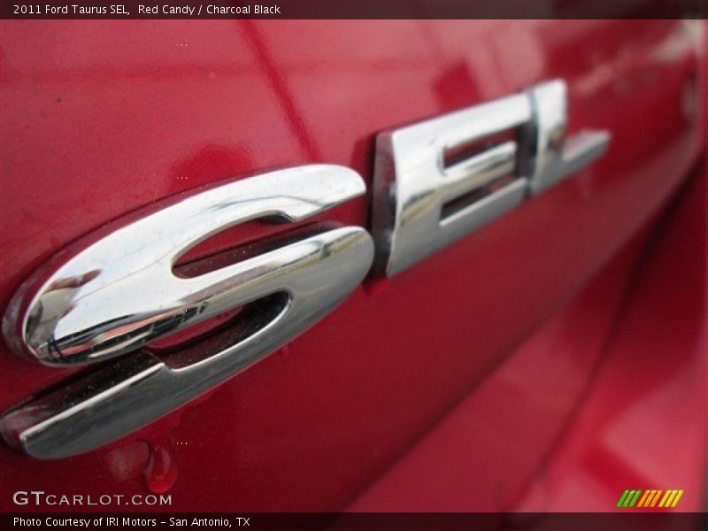 Red Candy / Charcoal Black 2011 Ford Taurus SEL