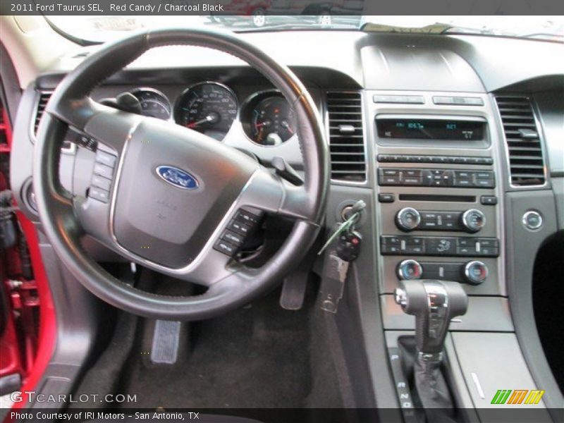Red Candy / Charcoal Black 2011 Ford Taurus SEL