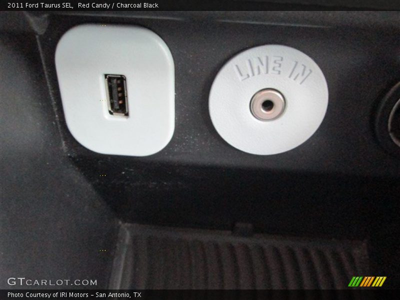 Red Candy / Charcoal Black 2011 Ford Taurus SEL