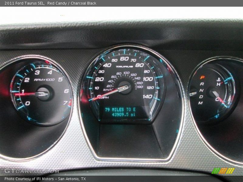 Red Candy / Charcoal Black 2011 Ford Taurus SEL