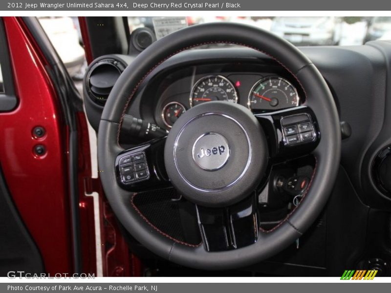 Deep Cherry Red Crystal Pearl / Black 2012 Jeep Wrangler Unlimited Sahara 4x4