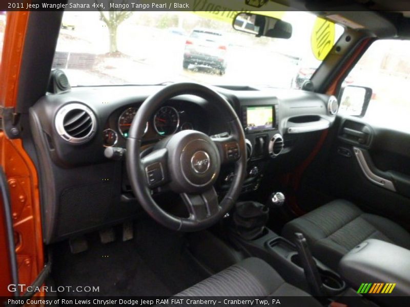 Mango Tango Pearl / Black 2011 Jeep Wrangler Sahara 4x4