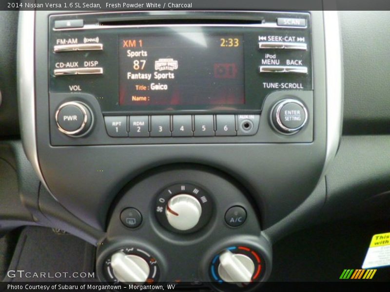 Fresh Powder White / Charcoal 2014 Nissan Versa 1.6 SL Sedan