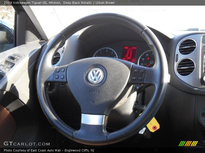 Deep Black Metallic / Urban Brown 2009 Volkswagen Tiguan SEL 4Motion