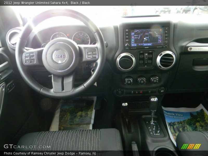 Black / Black 2012 Jeep Wrangler Unlimited Sahara 4x4