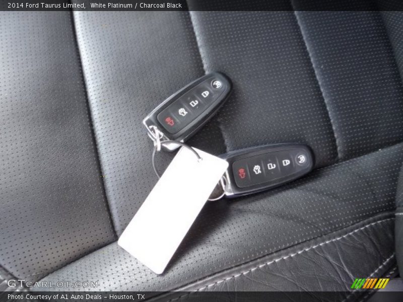 White Platinum / Charcoal Black 2014 Ford Taurus Limited