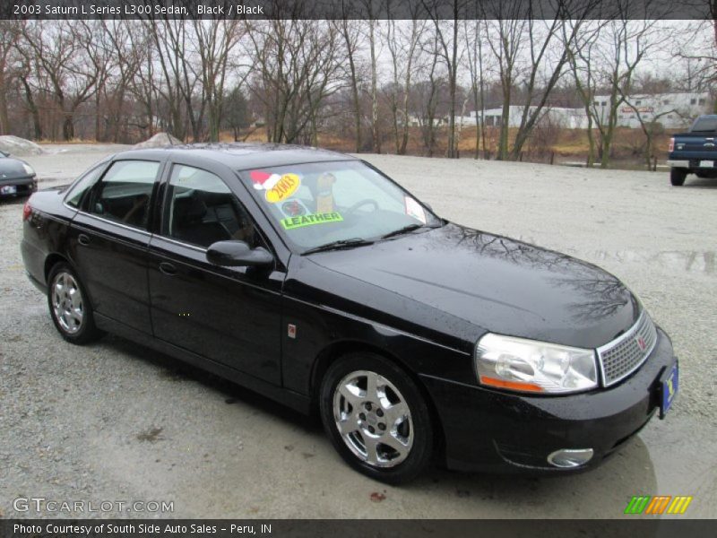 Front 3/4 View of 2003 L Series L300 Sedan