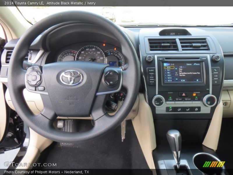 Dashboard of 2014 Camry LE