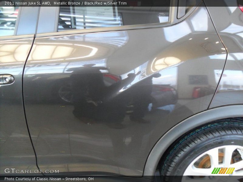 Metallic Bronze / Black/Red w/Silver Trim 2011 Nissan Juke SL AWD