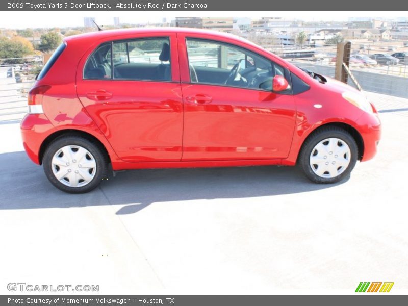 Absolutely Red / Dark Charcoal 2009 Toyota Yaris 5 Door Liftback
