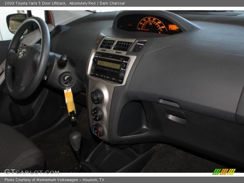 Absolutely Red / Dark Charcoal 2009 Toyota Yaris 5 Door Liftback