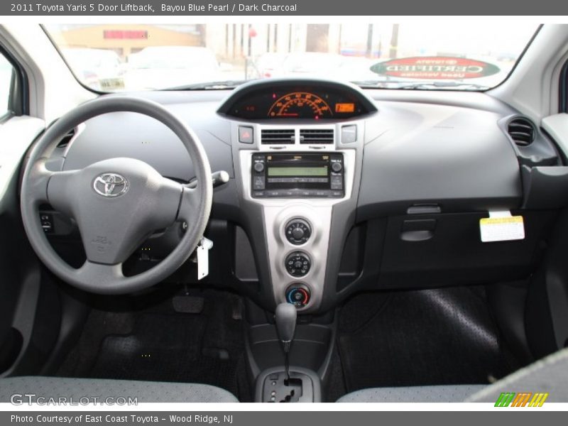 Bayou Blue Pearl / Dark Charcoal 2011 Toyota Yaris 5 Door Liftback