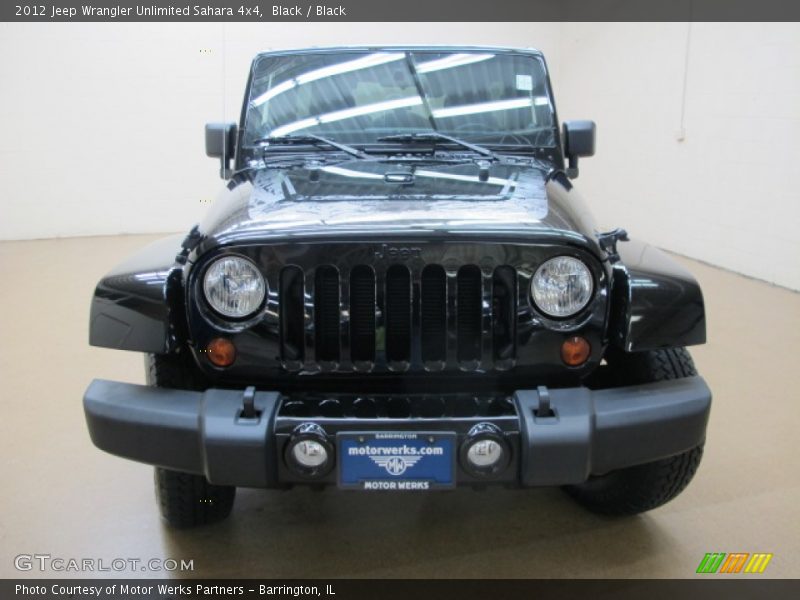 Black / Black 2012 Jeep Wrangler Unlimited Sahara 4x4
