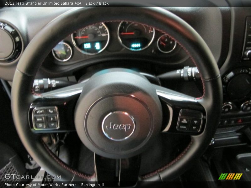 Black / Black 2012 Jeep Wrangler Unlimited Sahara 4x4