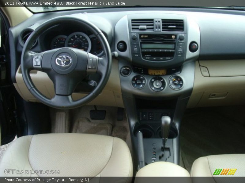 Black Forest Metallic / Sand Beige 2011 Toyota RAV4 Limited 4WD