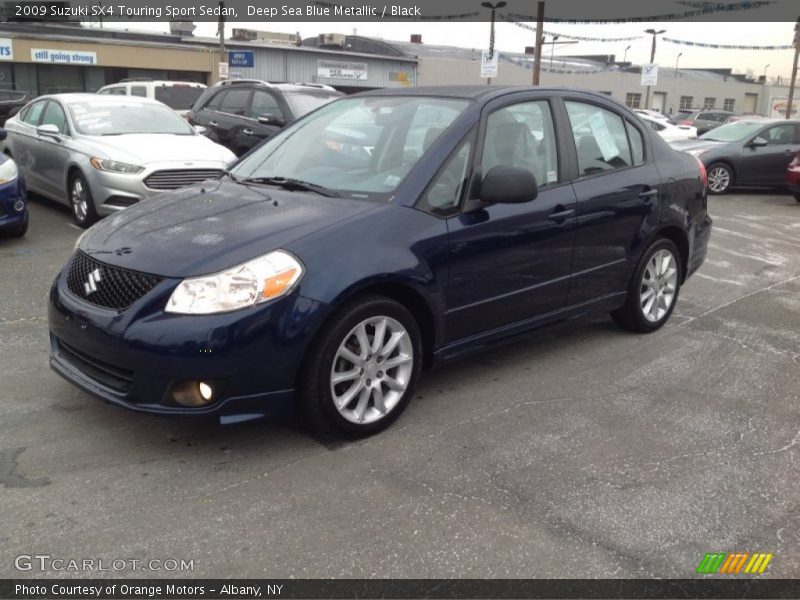 Deep Sea Blue Metallic / Black 2009 Suzuki SX4 Touring Sport Sedan