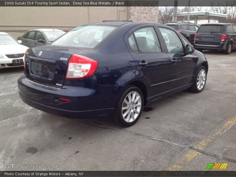 Deep Sea Blue Metallic / Black 2009 Suzuki SX4 Touring Sport Sedan