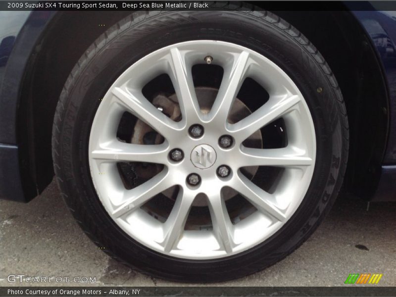 Deep Sea Blue Metallic / Black 2009 Suzuki SX4 Touring Sport Sedan