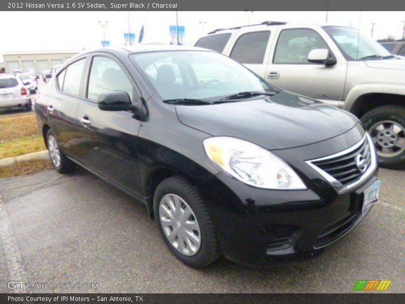 Super Black / Charcoal 2012 Nissan Versa 1.6 SV Sedan