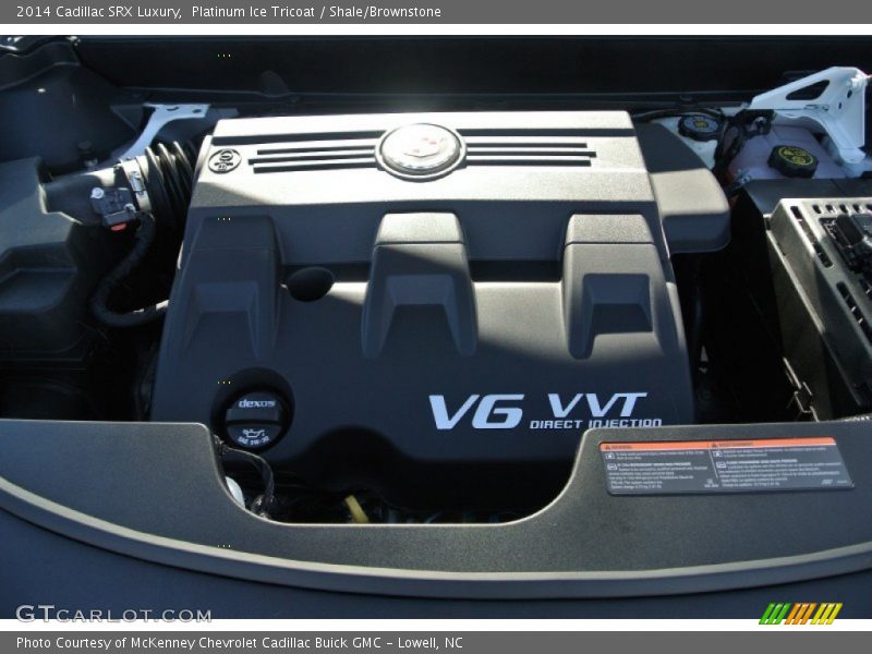 Platinum Ice Tricoat / Shale/Brownstone 2014 Cadillac SRX Luxury