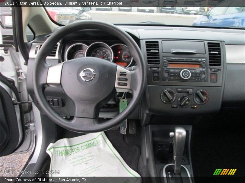 Brilliant Silver Metallic / Charcoal 2011 Nissan Versa 1.8 S Sedan