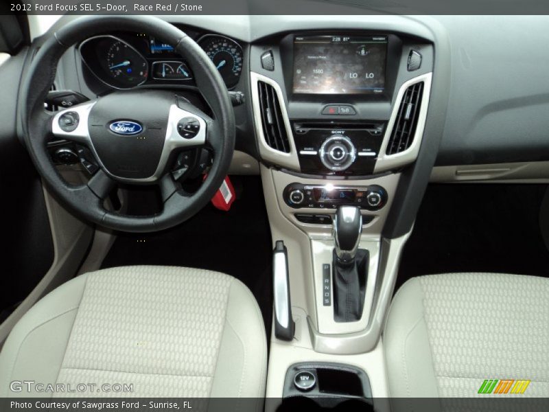 Race Red / Stone 2012 Ford Focus SEL 5-Door