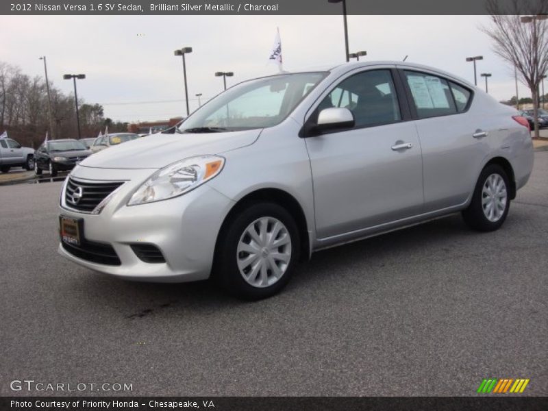 Brilliant Silver Metallic / Charcoal 2012 Nissan Versa 1.6 SV Sedan