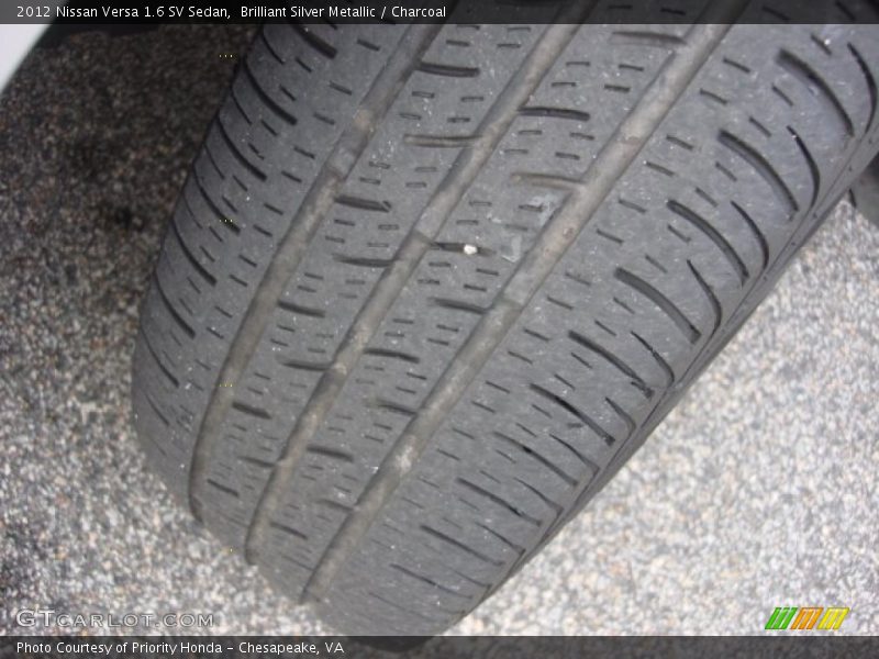 Brilliant Silver Metallic / Charcoal 2012 Nissan Versa 1.6 SV Sedan
